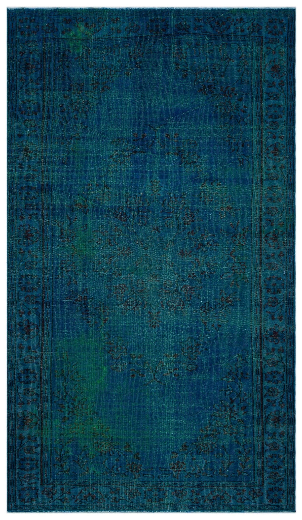 Deep blue vintage-style rug with a faded black floral medallion and intricate border pattern.