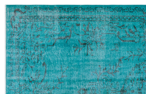 Load image 1 in gallery view. Teal rug with a distressed, faded black traditional medallion pattern.
