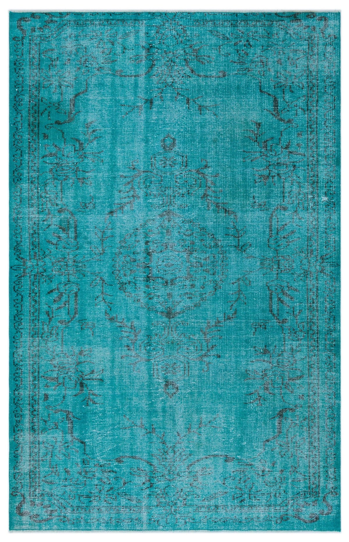 Teal distressed rug with a faded black traditional floral medallion pattern and a decorative border.