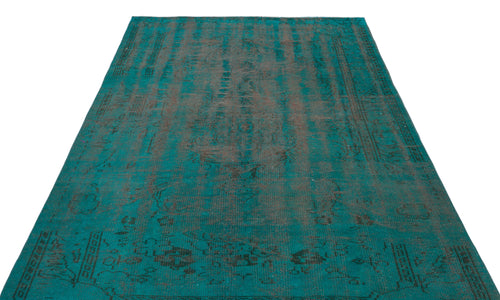 Load image 1 in gallery view. Teal and charcoal distressed vintage-style rug with a faded traditional medallion pattern on a white background.
