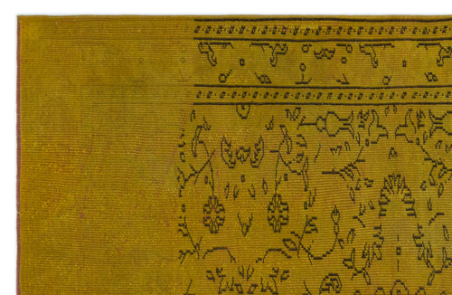Load image 1 in gallery view. Mustard yellow rug with a dark brown linear border and intricate, stylized floral motifs.
