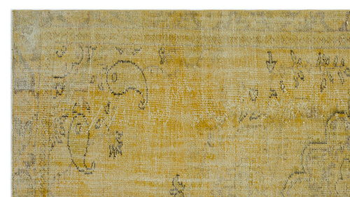 Load image 1 in gallery view. Mustard yellow and cream distressed rug with a faded, traditional paisley and floral pattern.