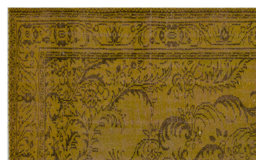 Load image 1 in gallery view. Mustard yellow and dark brown vintage-style rug with a distressed floral medallion pattern and ornate border.