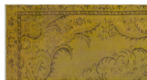 Load image 1 in gallery view. Mustard yellow vintage-style rug with a dark brown floral vine pattern and a decorative border.