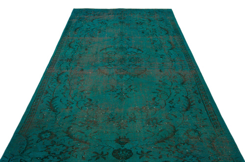 Load image 1 in gallery view. Teal distressed rug with a dark grey traditional floral medallion pattern on a white background.