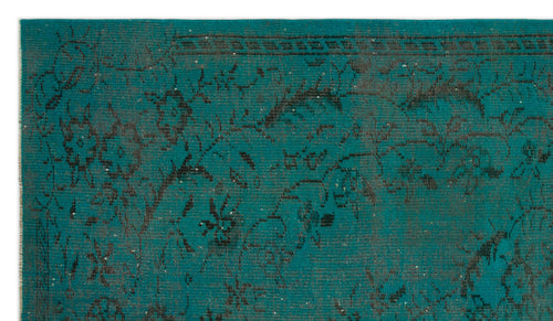 Load image 1 in gallery view. Teal rug with a distressed black floral pattern and a linear border.