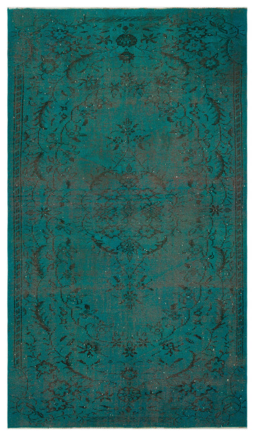 Load image 1 in gallery view. Teal and charcoal distressed rug with a traditional floral medallion pattern and a decorative border.