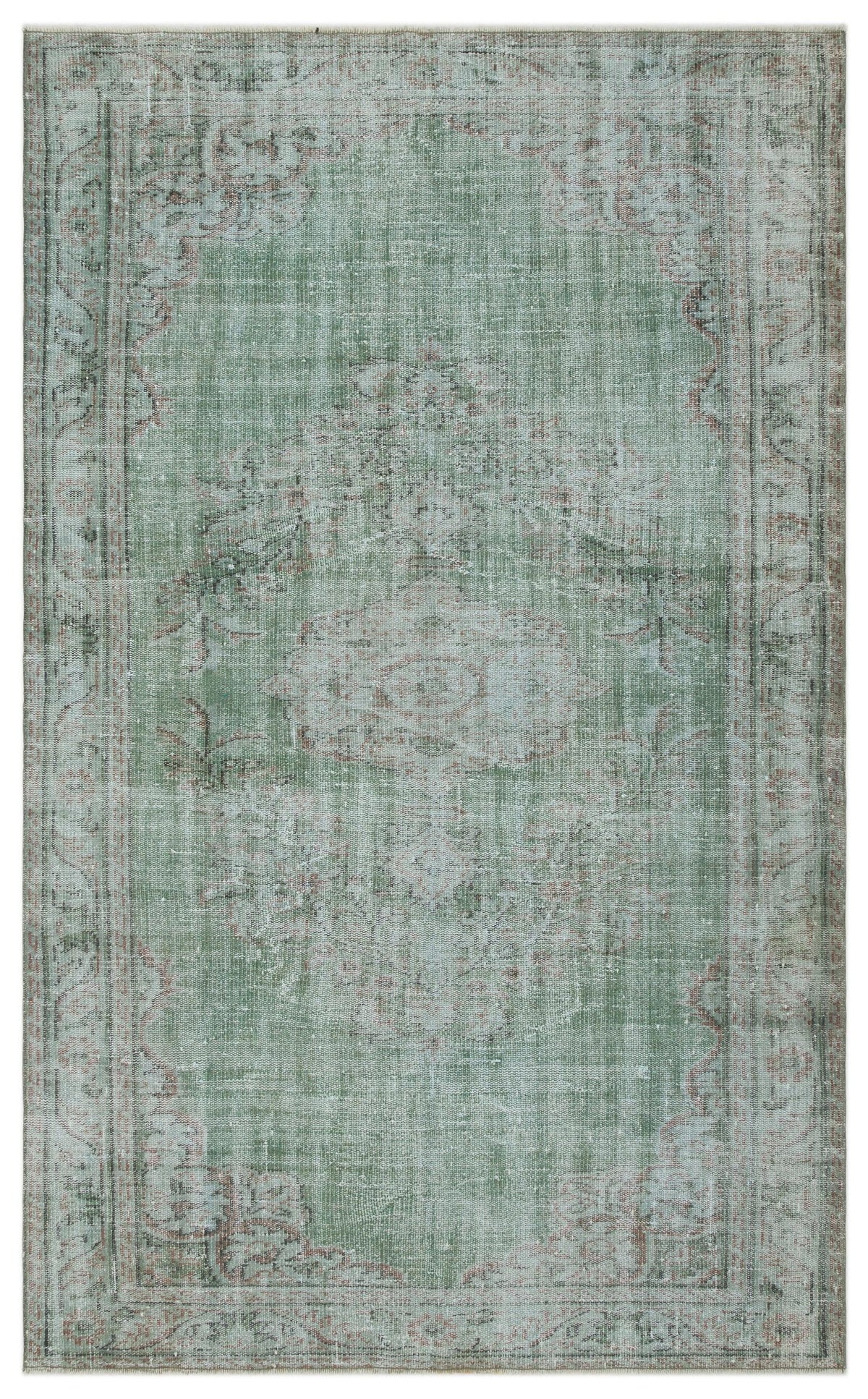 Sage green distressed traditional rug with a faded central medallion and ornate border pattern.