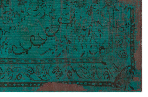 Load image 1 in gallery view. Teal and dark brown rug with a distressed, traditional floral medallion pattern and a bordered edge.