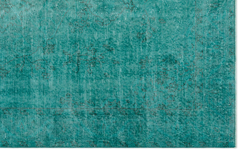 Load image 1 in gallery view. Teal distressed rug with a faded, traditional overdyed pattern on a white background.