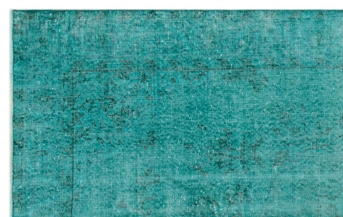 Load image 1 in gallery view. Teal distressed rug with a faded black traditional floral pattern on a white background.