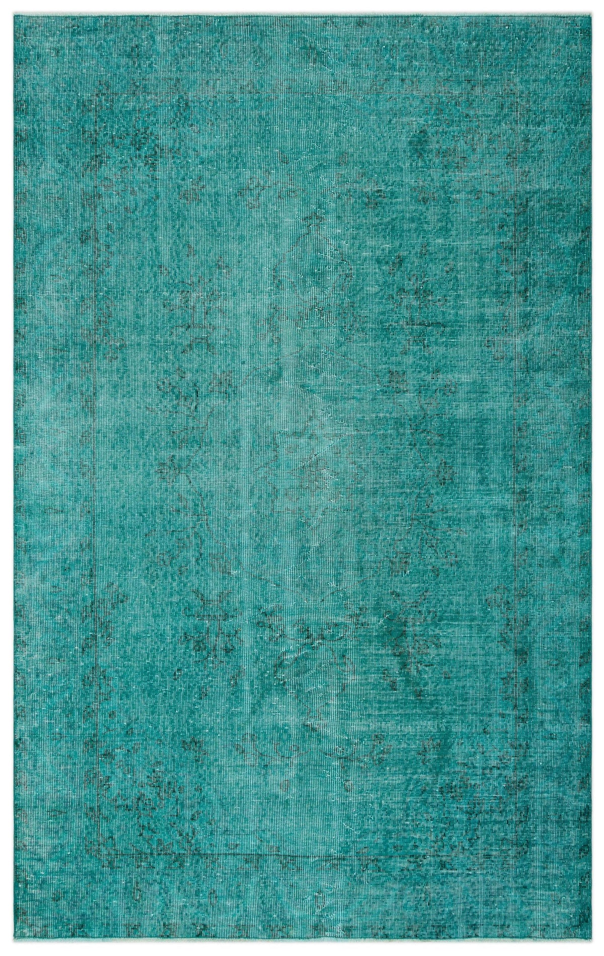 Teal monochromatic rug with a distressed, faded traditional medallion pattern.