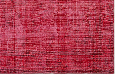 Load image 1 in gallery view. Distressed magenta and crimson overdyed rug with a faint, worn traditional pattern.