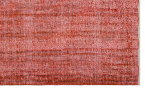 Load image 1 in gallery view. Distressed coral and red rug with a faded, textured weave and fringed edge on a white background.