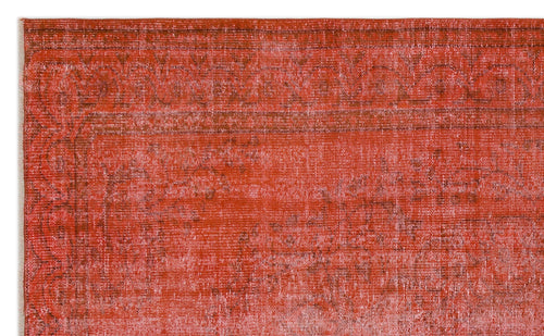 Load image 1 in gallery view. Distressed terracotta and rust-colored rug with a faded traditional border and medallion pattern.