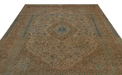 Load image 1 in gallery view. Tan and blue traditional Persian-style rug with a central floral medallion and intricate border on a white background.