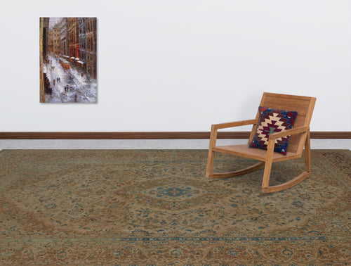 Load image 1 in gallery view. Tan and blue traditional floral medallion rug in a room with a wooden rocking chair and wall art.