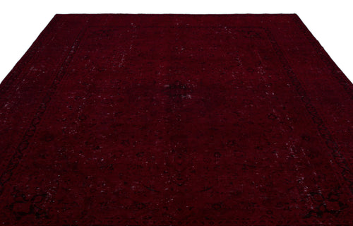 Load image 1 in gallery view. Deep burgundy traditional rug with a distressed, faded black floral medallion pattern on a white background.