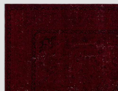 Load image 1 in gallery view. Deep red distressed rug with a dark, intricate traditional border and faded floral motifs.