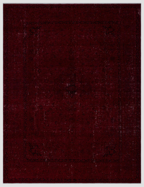 Load image 1 in gallery view. Deep burgundy distressed rug with a faint, traditional black floral medallion pattern and a decorative border.