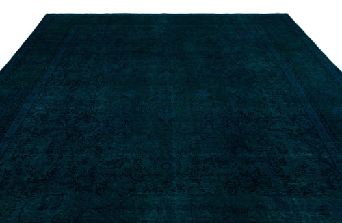 Load image 1 in gallery view. Dark teal monochromatic rug with a subtle, tone-on-tone traditional floral medallion pattern.