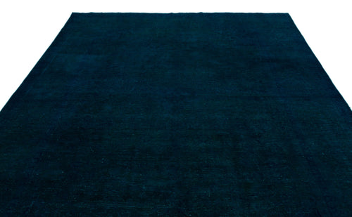 Load image 1 in gallery view. Solid dark navy blue rug with a subtle, distressed texture on a white background.