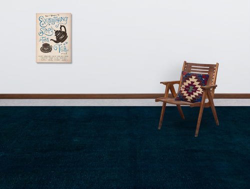 Load image 1 in gallery view. Solid dark navy blue rug in a room with a wooden chair and wall art.