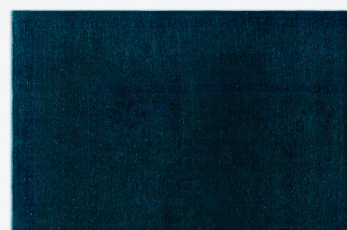 Load image 1 in gallery view. Solid deep teal rug with a subtle, tonal distressed border pattern on a white background.