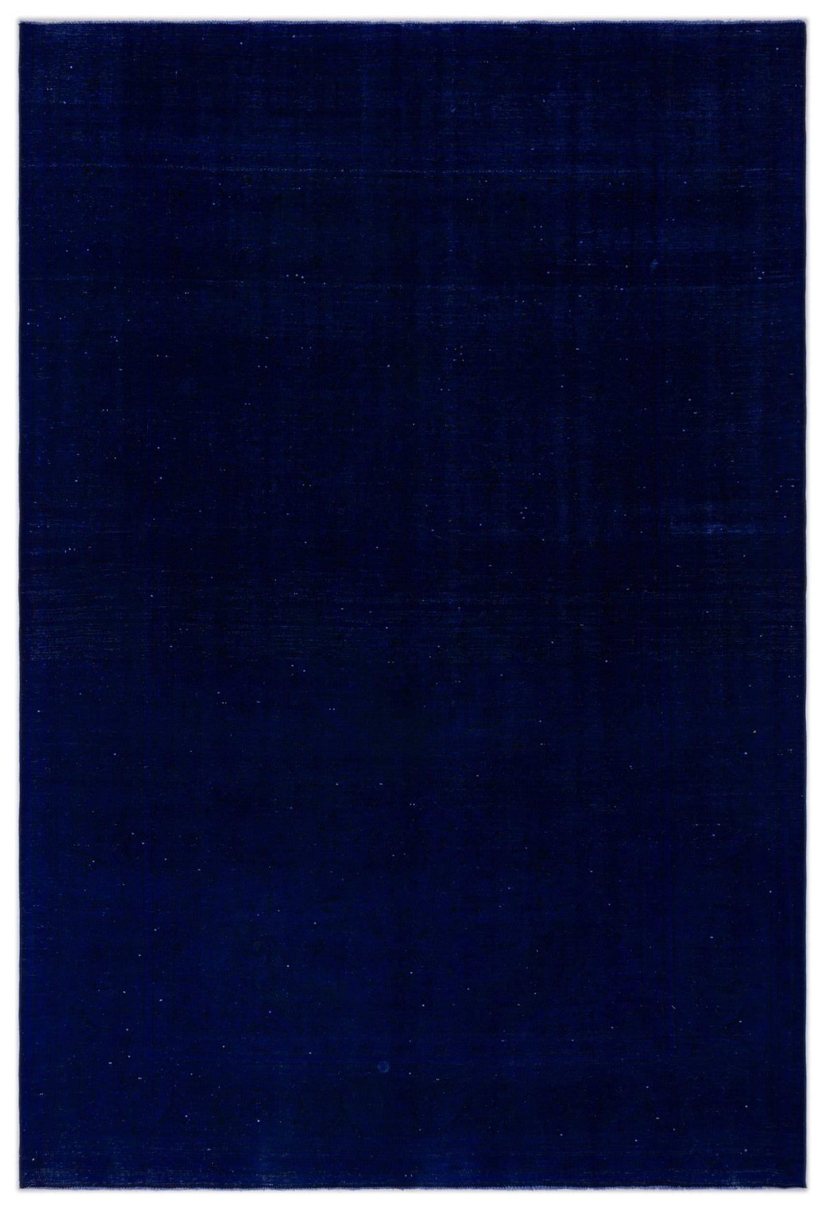 Solid deep navy blue rug with a subtle, distressed texture and faint, worn-in grid pattern.