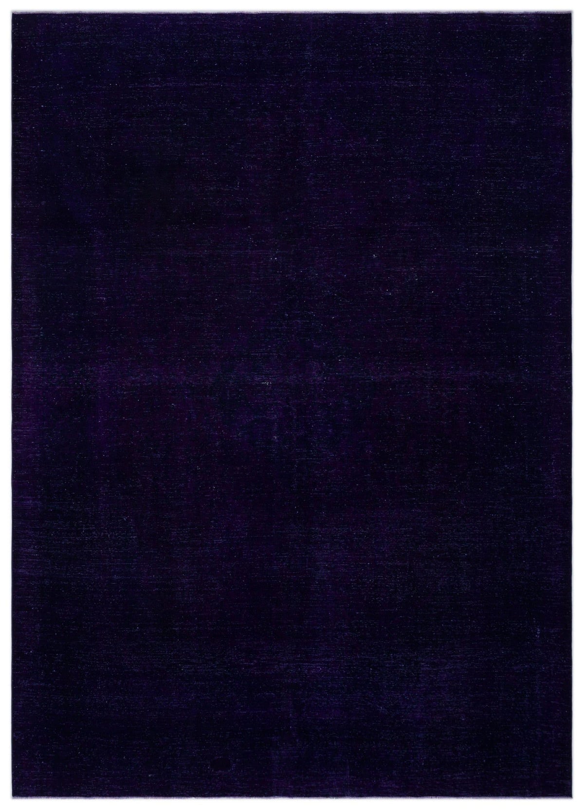 Solid deep purple rug with a subtle, uniform textured weave on a white background.