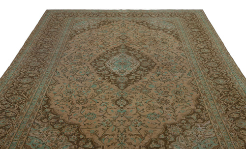 Load image 1 in gallery view. Brown and teal traditional Persian-style rug with a central floral medallion and intricate vine border.