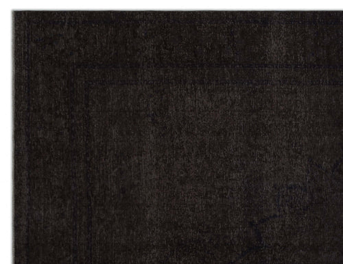Load image 1 in gallery view. Solid black rug with a subtle, tone-on-tone distressed border pattern.
