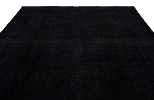 Load image 1 in gallery view. Solid black rug with a subtle, distressed texture on a white background.
