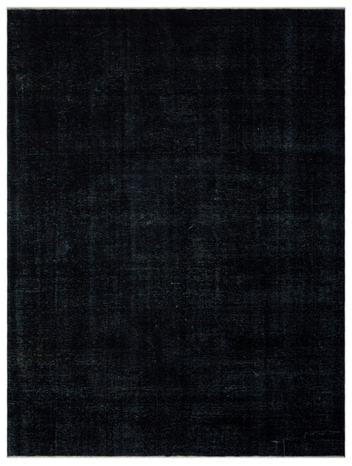 Load image 1 in gallery view. Solid black rug with a subtle, distressed texture and faint tonal variations.