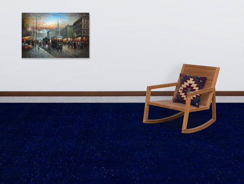Load image 1 in gallery view. Solid navy blue rug with subtle speckled texture, styled in a room with a wooden rocking chair and wall art.