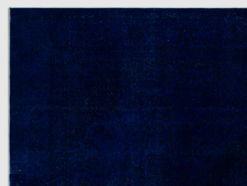 Load image 1 in gallery view. Deep navy blue rug with a subtle, tonal traditional floral pattern and a bordered edge.