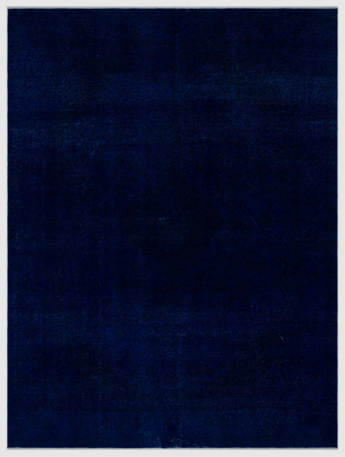 Load image 1 in gallery view. Solid navy blue rug with a subtle, tone-on-tone traditional medallion pattern.