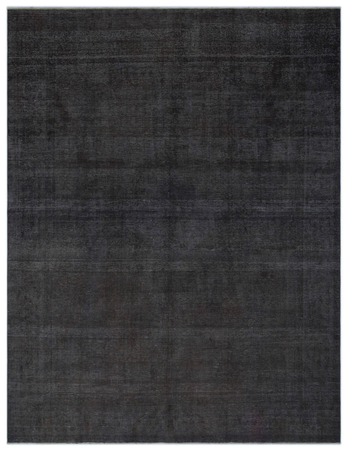 Solid charcoal grey rug with a subtle, distressed grid texture on a white background.
