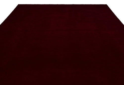 Load image 1 in gallery view. Solid deep burgundy rug with a short, uniform pile on a white background.
