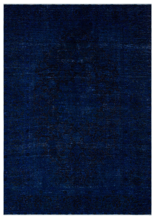 Load image 1 in gallery view. Deep navy blue rug with a subtle, distressed traditional medallion pattern.