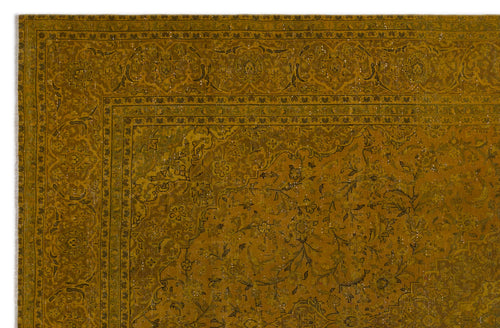 Load image 1 in gallery view. Mustard yellow distressed rug with a traditional floral medallion pattern and a detailed border.