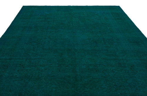 Load image 1 in gallery view. Solid deep teal rug with a subtle, distressed vintage-style texture and faint border detail.