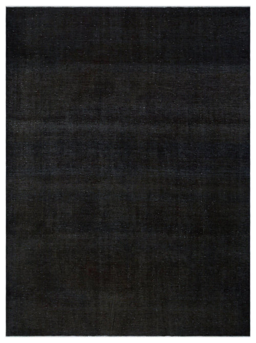 Load image 1 in gallery view. Solid black rug with a subtle, distressed horizontal texture and faint white flecks.
