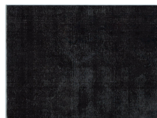 Load image 1 in gallery view. Solid black rug with a distressed, vintage-style texture on a white background.