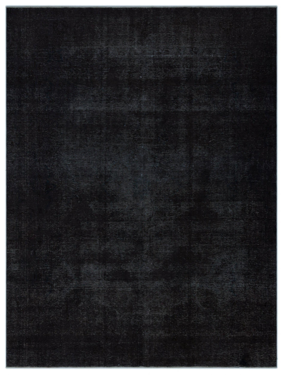 Solid black rug with a subtle, distressed, and faded texture.