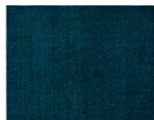Load image 1 in gallery view. Deep teal monochromatic rug with a subtle, tone-on-tone traditional medallion pattern.