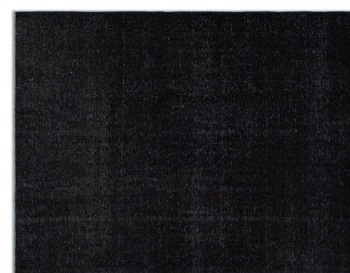 Load image 1 in gallery view. Solid black rug with a subtle, distressed vintage texture.