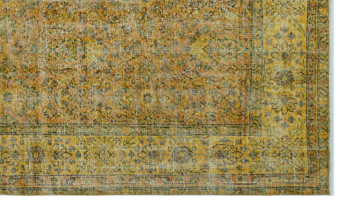Load image 1 in gallery view. Distressed mustard yellow and olive green traditional rug with an intricate floral medallion border pattern.