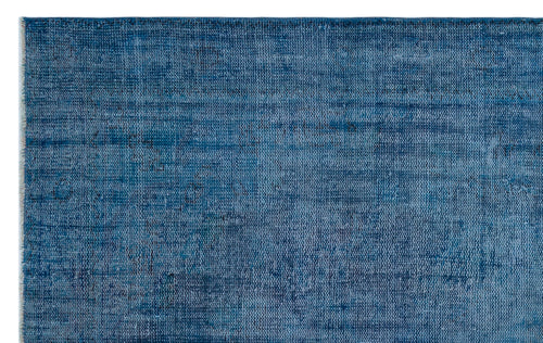 Load image 1 in gallery view. Solid blue rug with a distressed, textured weave and subtle horizontal tonal variations.