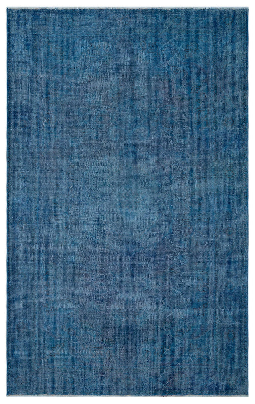 Load image 1 in gallery view. Solid blue rug with a distressed, textured finish and subtle vertical tonal variations.